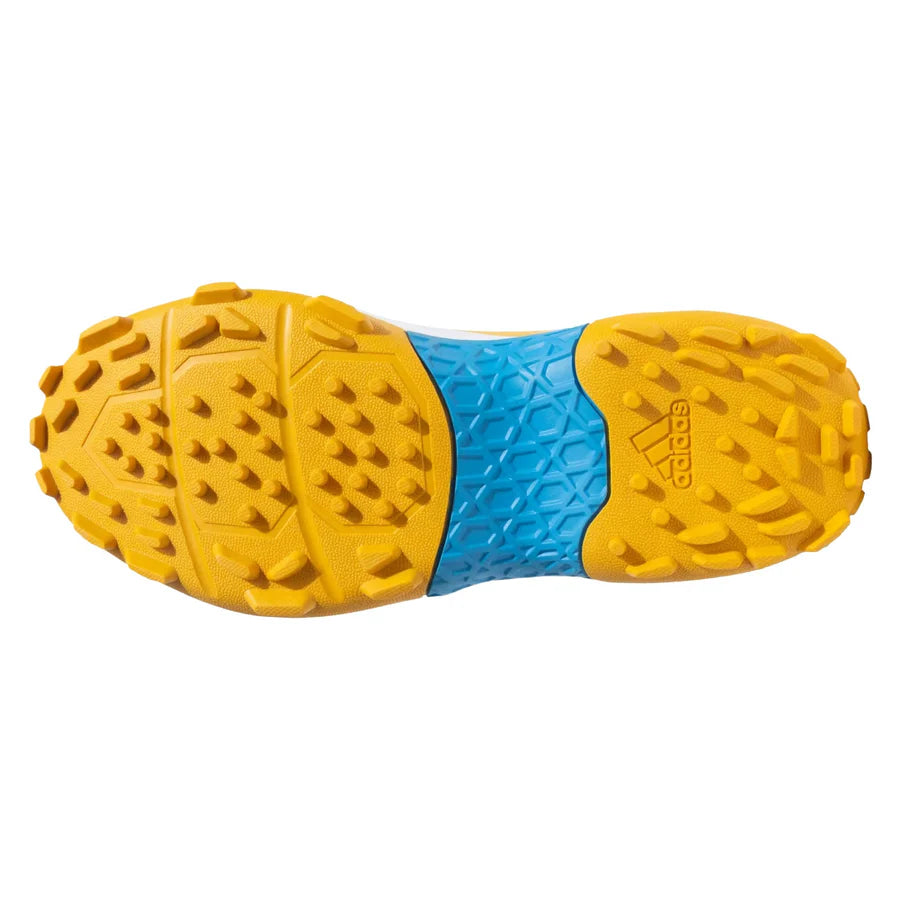 Heel profile of the Adidas CRINU 23 Cricket Shoes highlighting the sturdy ankle collar design and stitching.