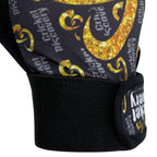 Close-up of the reinforced thumb stitching on the CD & FMC Pro Tape Ball Inner gloves.