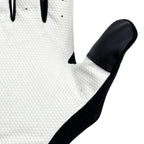 Close-up of the reinforced thumb area on the white Cric Class Master Tape Ball Inner under-gloves.