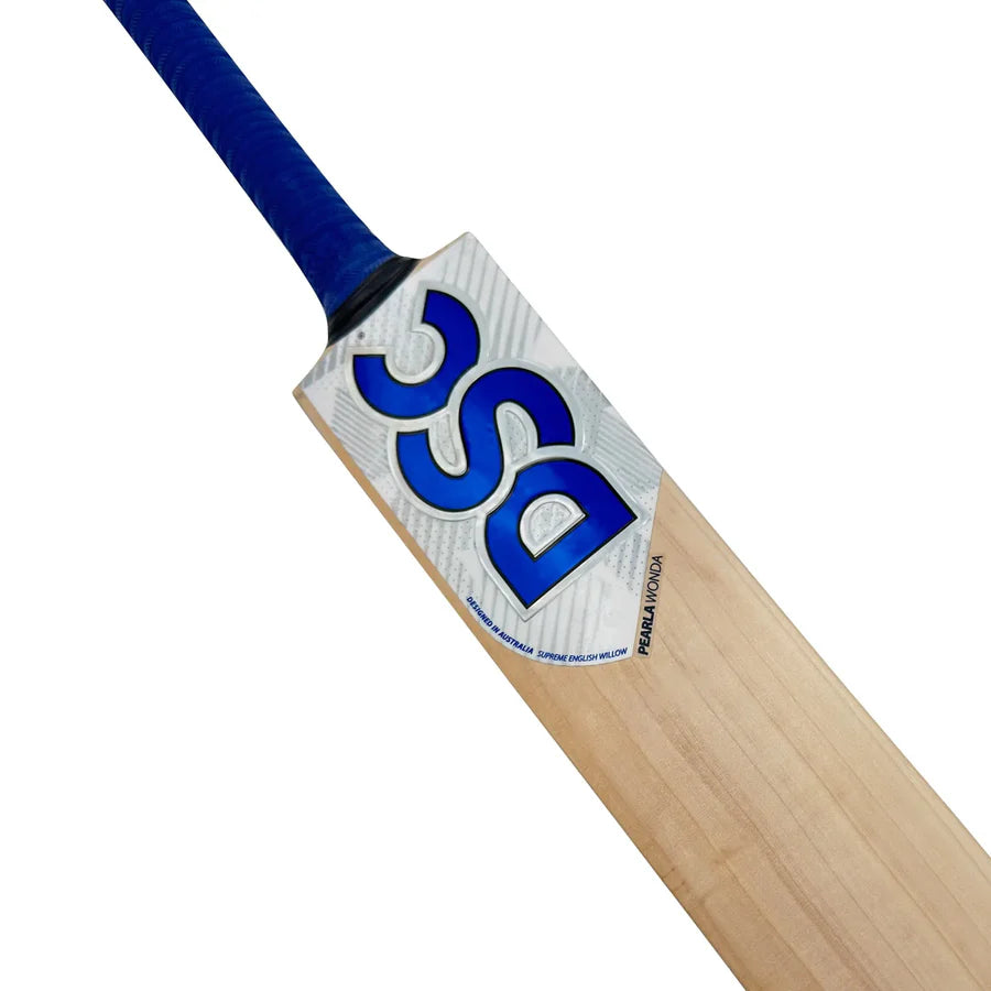 Player executing a drive shot using the DSC Pearla Wonda cricket bat.


