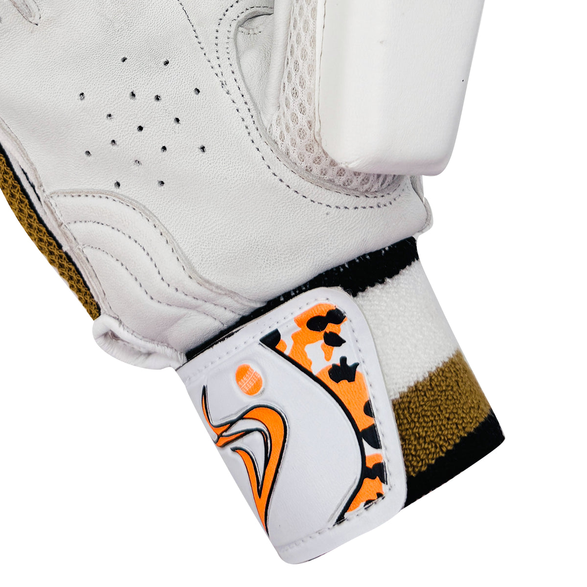 Close-up of the patterned wristband and strap closure on the DS D 1.0 WhiteGold youth cricket batting glove.