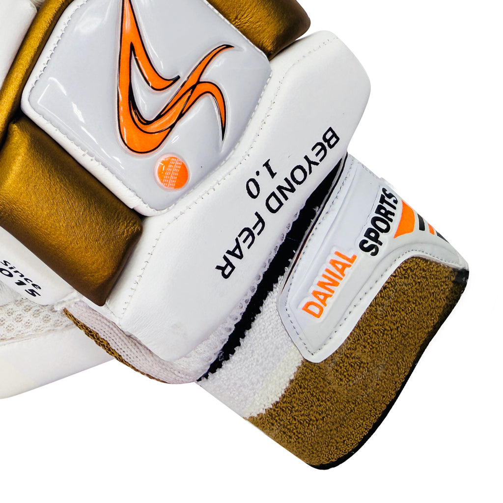 Close-up of the Danial Sports wristband and brand lettering on the youth batting glove.