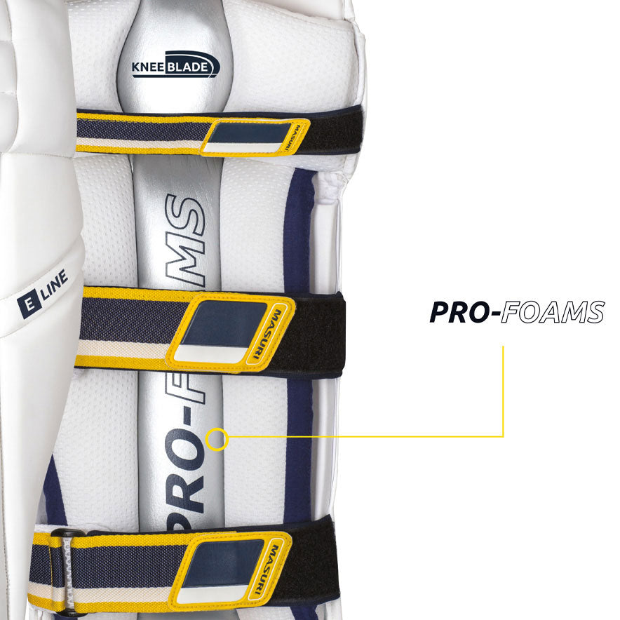 Interior bolster of Masuri E LINE Cricket Batting Pads displaying navy and yellow Pro-Foams straps.