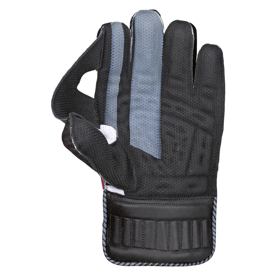 Close-up detail of the unique thumb setting and molded catching cup on the Kookaburra gloves.

