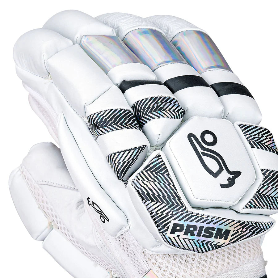 Kookaburra Prism 4.1 gloves in a batting grip position on a cricket bat handle.