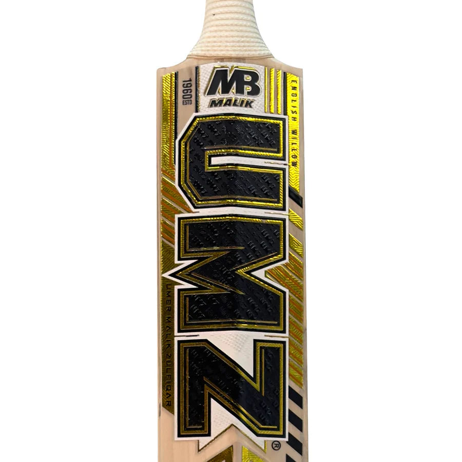 Close-up of the premium 5-cork full cane handle on the MB Malik Platinum Gold Edition pro bat.