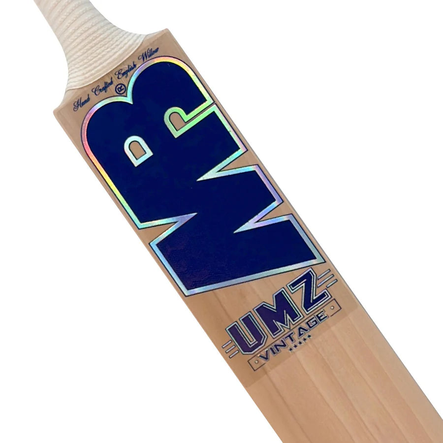 Zoomed-in shot of the premium 3D textured graphics and MB Malik Vintage metallic embossed decals on the lower blade.