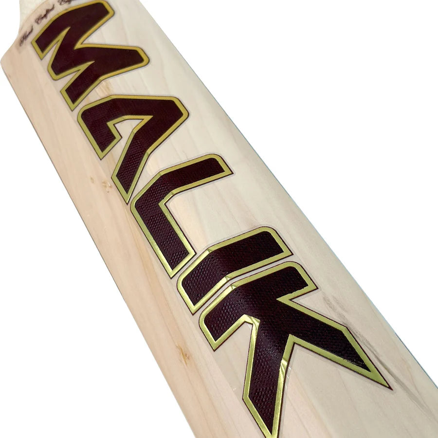 Detailed view of the eye-catching vintage graphics and metallic embossed 7-star branding on the MB Malik cricket bat face.