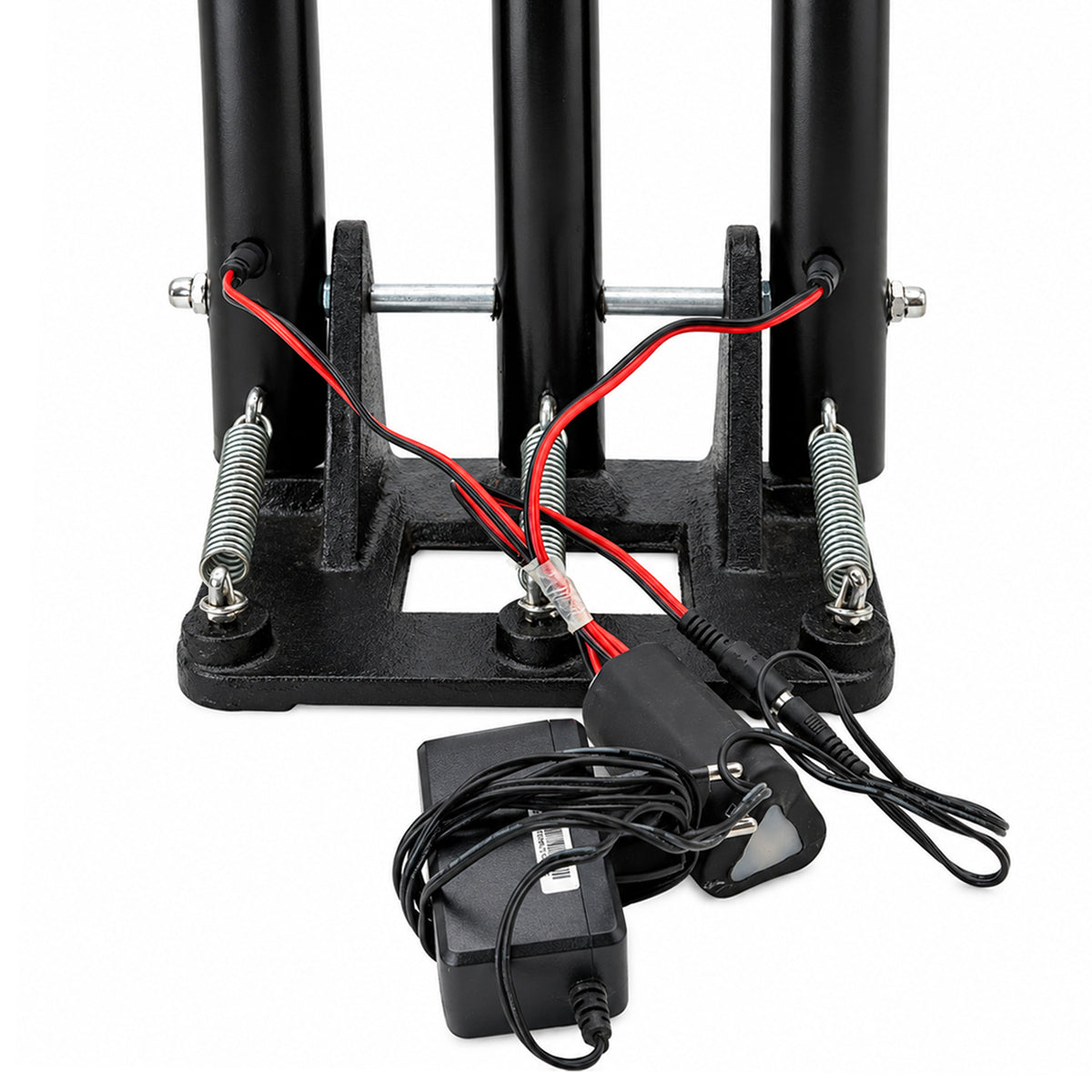 Full front perspective of black LED spring-loaded stumps connected to power adapter.