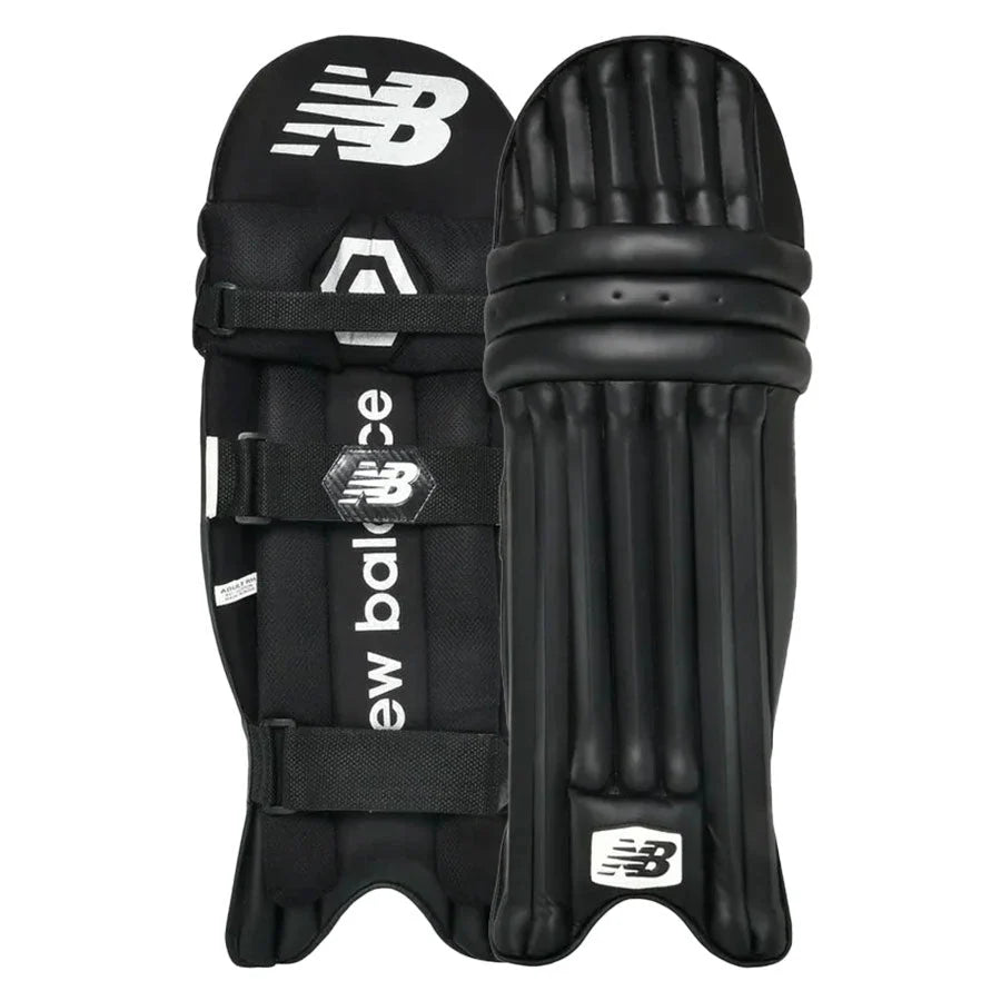 Front view of New Balance CS 8i Batting Pads in premium white featuring the traditional multi-section cane rod structure.