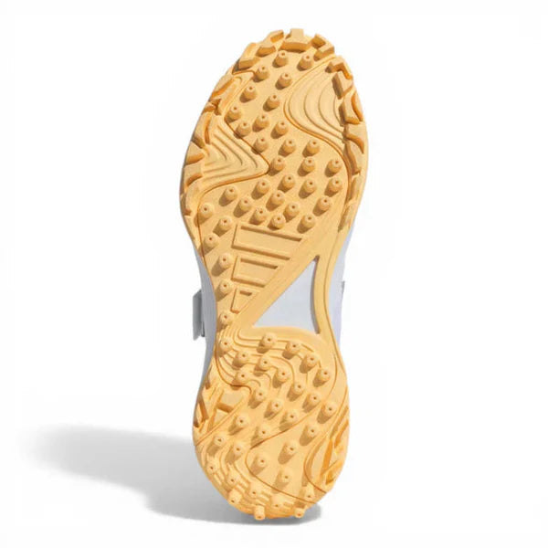 High-traction rubber outsole of Adidas ScoreRun 2.0 for all pitch surfaces