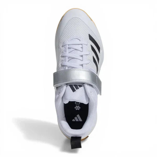 Professional Adidas ScoreRun 2.0 cricket footwear on a match pitch