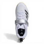 Professional Adidas ScoreRun 2.0 cricket footwear on a match pitch