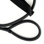 Close-up view of secure joint connection between rubber tubing and nylon strap on stretching band