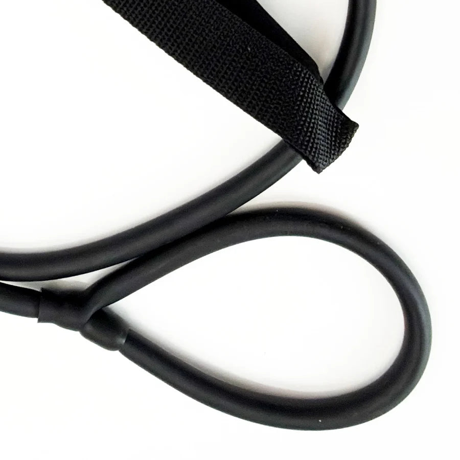 Close-up view of secure joint connection between rubber tubing and nylon strap on stretching band