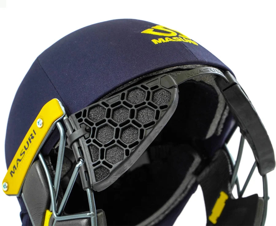 Side view of navy cricket helmet equipped with the clip-on Masuri Stem Guard Pro.