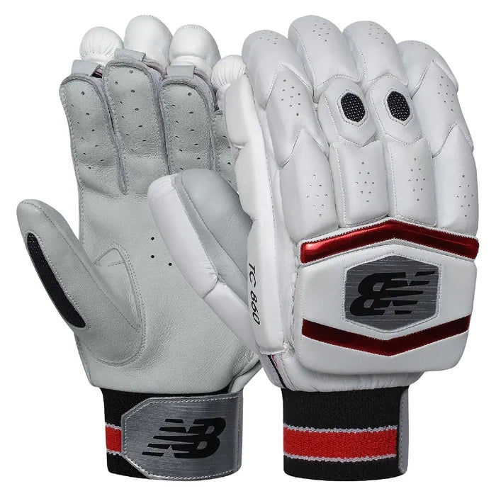 Front and back view of New Balance TC 860 white cricket batting pads with red branding