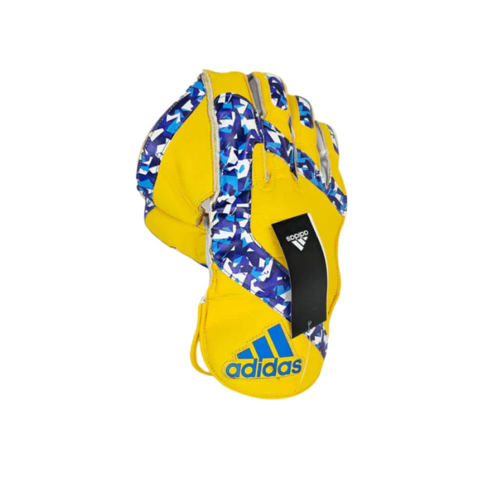 Side angle highlighting the reinforced additional finger protection layers on the yellow Adidas Pellara 3.0 Wicket Keeping Glove.