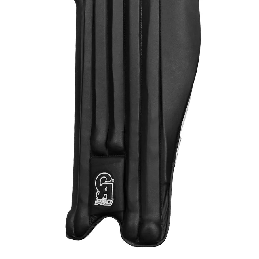 Top perspective view focusing on the upper bolsters of the CA Pro 10000 Batting Pads Black.