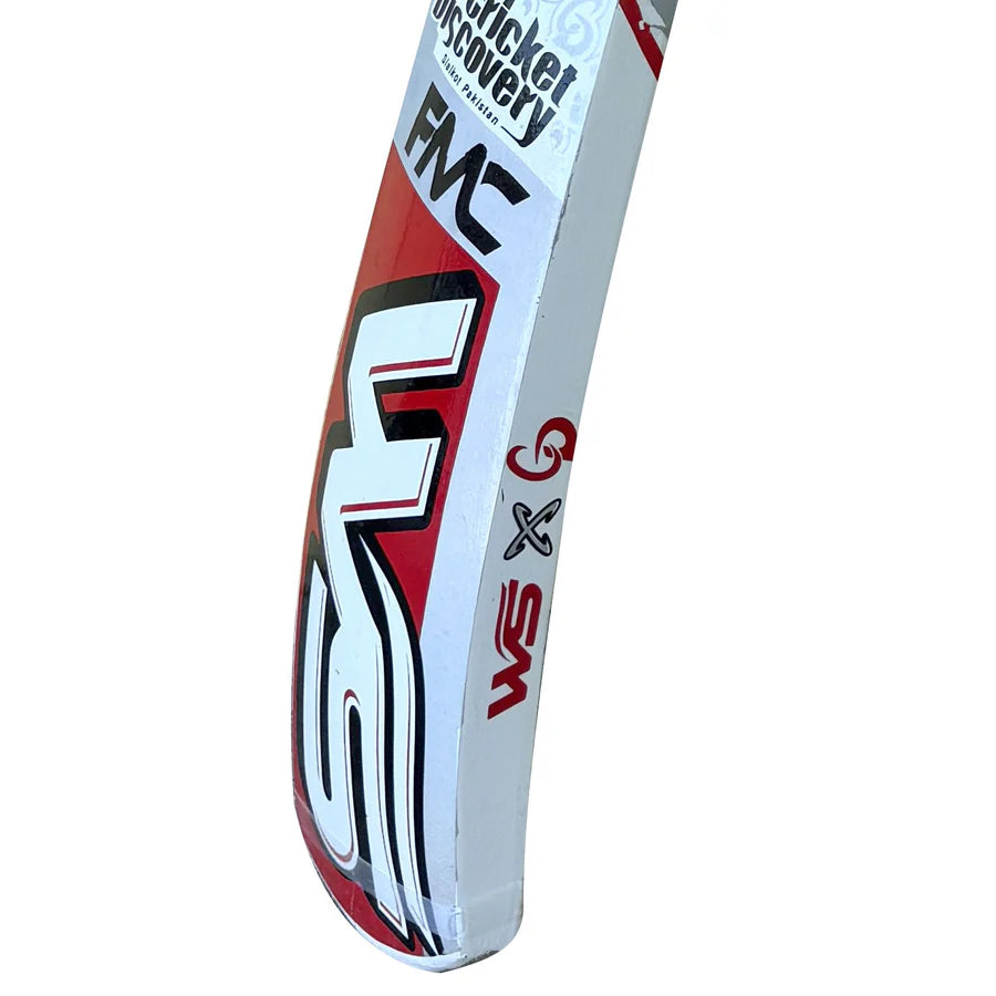 Close-up tracking the multi-layered colored grip pattern wrapped around the CD & WS FMC Victory Tape Ball Bat handle.