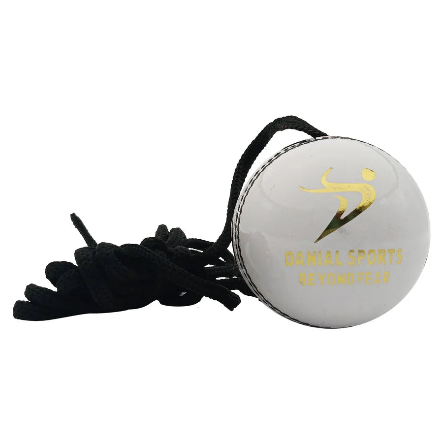 Cricket training ball with attached string for batsmen