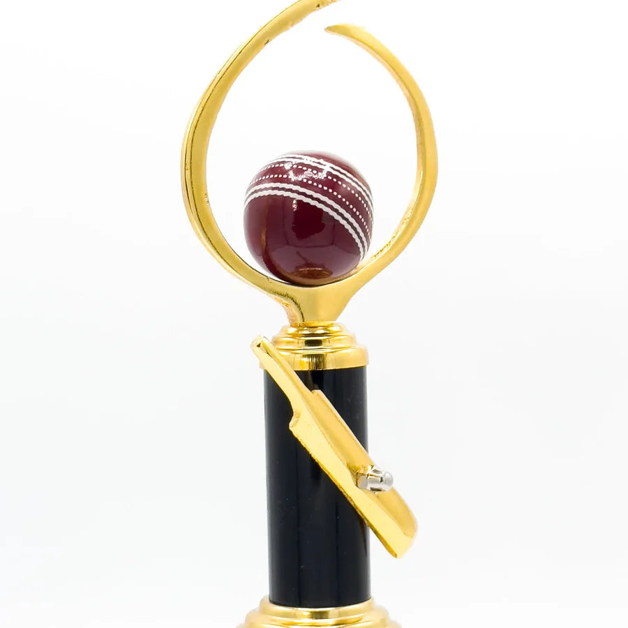 Close-up of the Pro Cricket Trophy -272's metal craftsmanship and custom engraving plate.