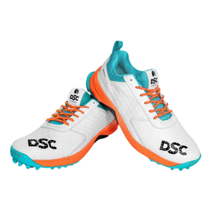 A pair of DSC Jaffa 22 cricket shoes in orange with white and turquoise accents, featuring a mesh upper and a rubber outsole.