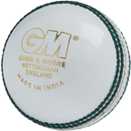 White Gunn & Moore Maestro Cricket Ball displaying gold GRADE 1 COUNTY MENS stamp and green seam stitching