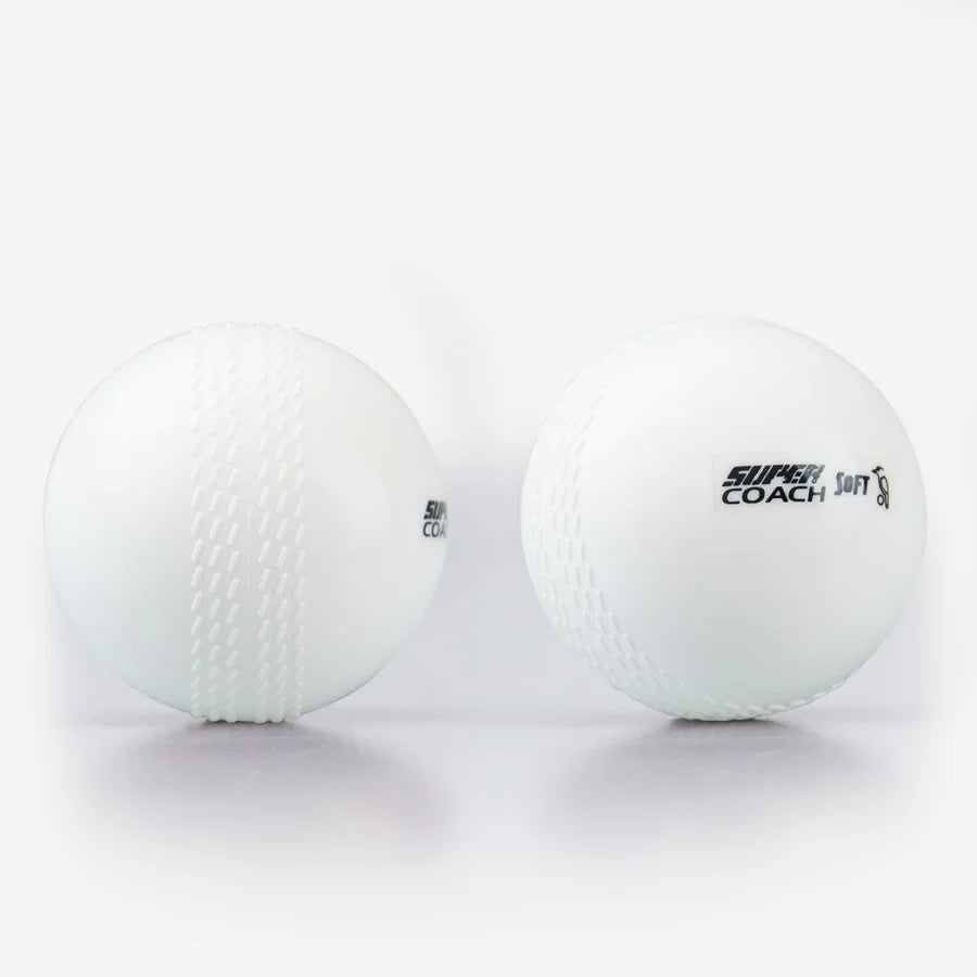White Kookaburra Super Coach Soft Cricket Balls displaying black branding text and soft seam profile
