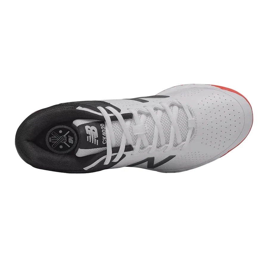 Rear view highlighting the stable molded heel overlay design and Fresh Foam midsole of the New Balance CK4020I4 Cricket Shoes.