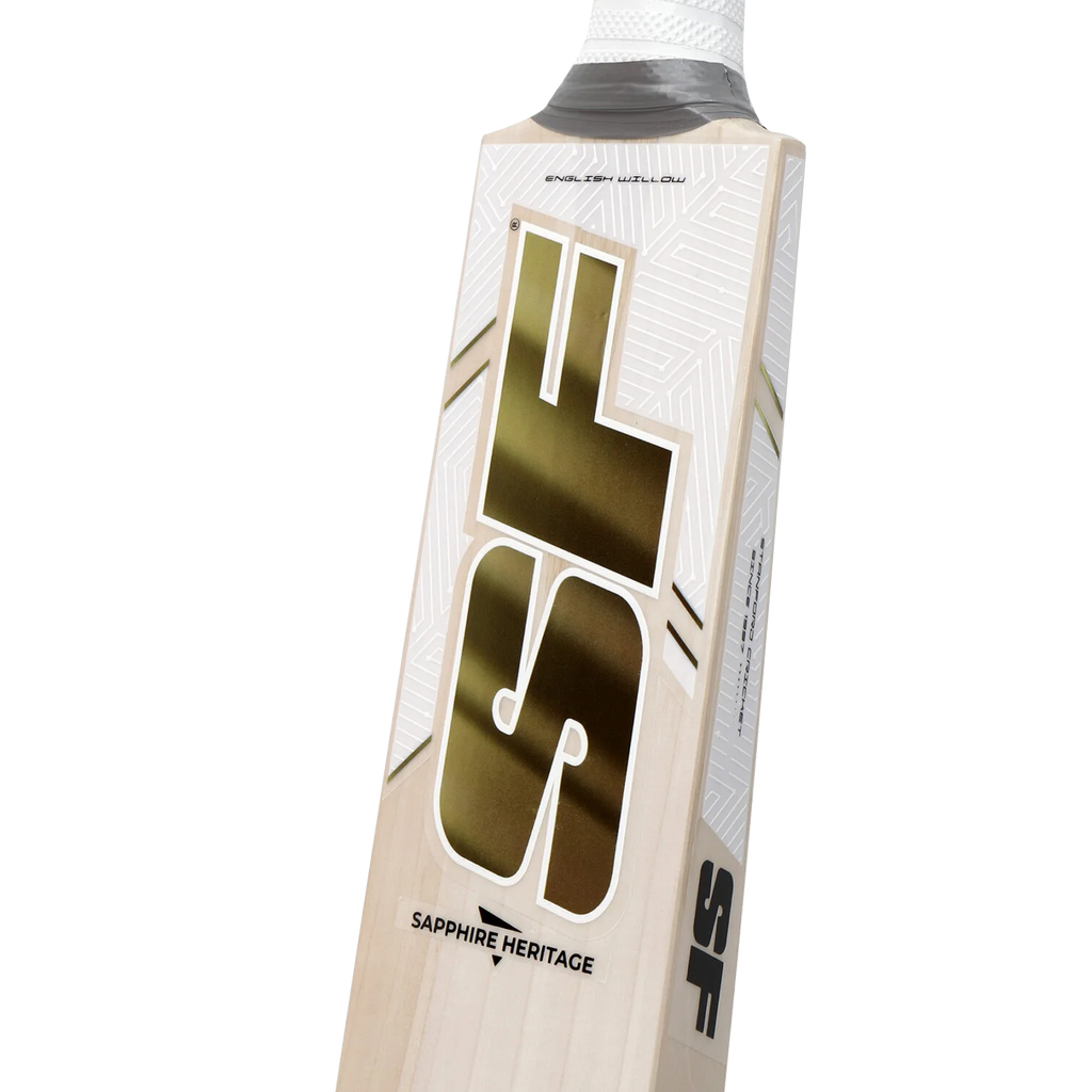 Close-up of the rounded rubber grip on the SF Sapphire Heritage cricket bat handle.

