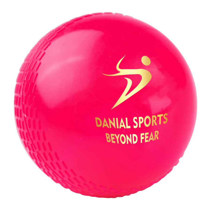 Close-up side view of the pink training ball highlighting the embossed seam for realistic bowling grip.