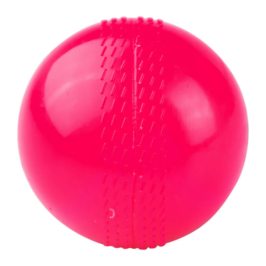 Senior and junior size pink wind cricket balls placed next to a standard cricket bat for scale.